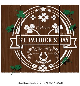 St.Patrick's day logo on wood texture
