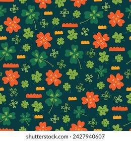 St.Patrick's Day seamless pattern with quatrefoil and shamrocks on dark green background. Perfect for wallpaper, gift paper, greeting cards. Vector illustration