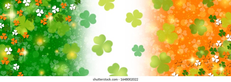 St.Patrick's Day vector banner template. Irish flag blurred background with clover leaves and bokeh effect