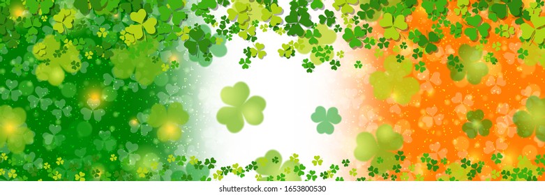 St.Patrick's Day vector banner template. Irish flag blurred background with clover leaves and bokeh effect