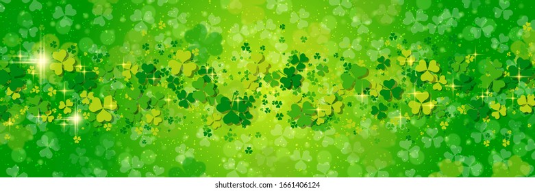 St.Patrick's Day vector banner template. Green blurred background with clover leaves and bokeh effect