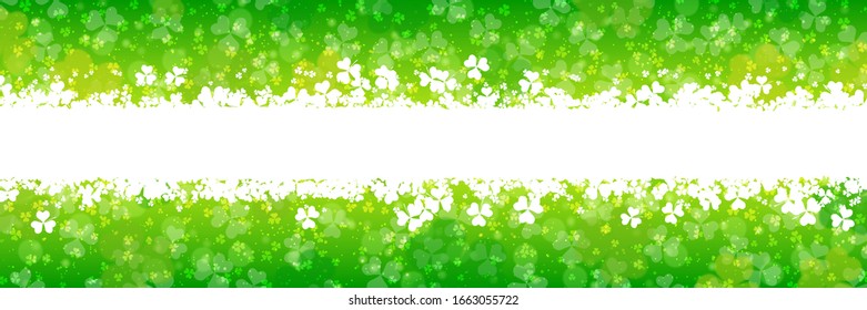 St.Patrick's Day vector banner template. Green blurred background with clover leaves and bokeh effect