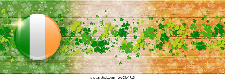 St.Patrick's Day vector banner template. Irish flag wooden background with colorful clover leaves