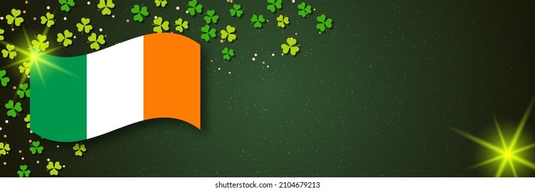 St.Patrick's Day vector banner template. Green background with colorful clover leaves and Irish flag
