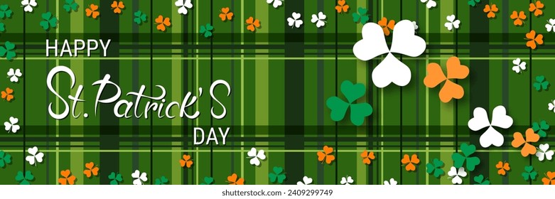 St.Patrick's Day vector banner template. Green plaid background with colorful clover leaves