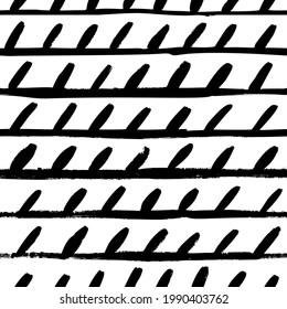 Straight lines and dashes vector seamless pattern. Black brush strokes, abstract texture. Grunge doodle geometric pattern, hand drawn tribal background. Horizontal brush strokes ink illustration