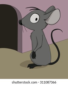 Strange mouse stopped at the entrance to its burrow