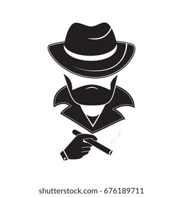 A Stranger In A Hat Holds A Smoking Cigarette In His Hand. Mafia Style