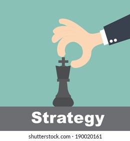 strategy concept - hand holding chess