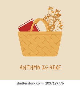 Straw basket with autumn elements: dried flowers and red book. Cozy autumn vibes. Autumn trendy set. Vector illustration in cartoon style. Isolated on white background.