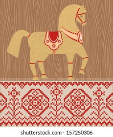 Straw horse. Vector illustration. Folklore style. Figurine and national embroidery. Wooden horse a symbol of New year.