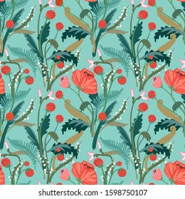 Strawberries and different herbs on a blue background