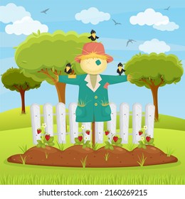 Strawberries in a garden bed with a scarecrow and crows. Landscape of a summer village, agriculture.