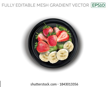 Strawberries with kiwi and banana slices on a black plate.