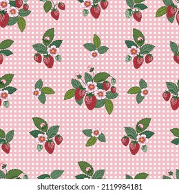 Strawberries on the pink plaid background