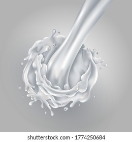 Corriente de leche vertida en un fondo gris