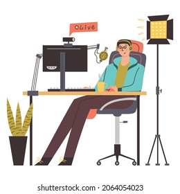 Streamer video games sitting at his computer. Desk with monitor, keyboard, webcam, microphone. Online game, lights, potted plant. Game room. Flat vector illustration