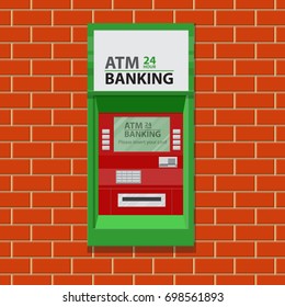 Street ATM teller machine on brick wall.
