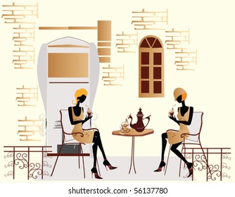 Street cafe with chatting girls