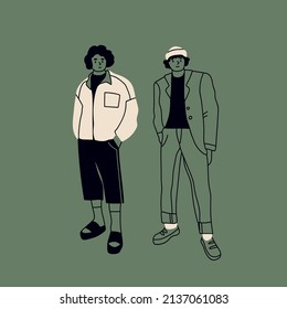 Street Fashion Look For Boys. Young Men Dressed In Stylish Trendy Oversized Clothing. Two Models Standing Together. Korean Japanese Asian Cartoon Style. Hand Drawn Vector Isolated Illustrations