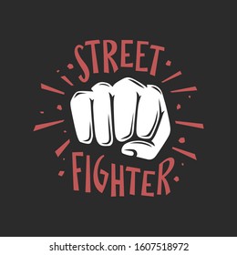 Street fighter t-shirt design with punch human fist. Trendy fancy handmade lettering composition. Vector vintage illustration.