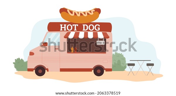 Street food truck or wagon with hot dog\
sausage snacks. Barbecue and fast food eatery caravan or truck,\
flat vector illustration isolated on white\
background.