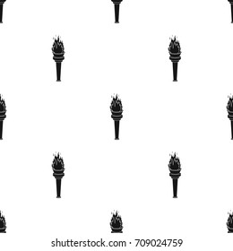 Street lamp in the form of a torch with an open fire.Lamppost single icon in black style vector symbol stock illustration web.