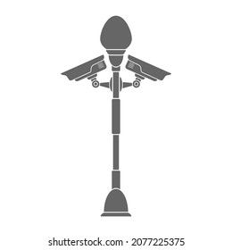 street lamp with a surveillance camera. Filled silhouette. Flat style.