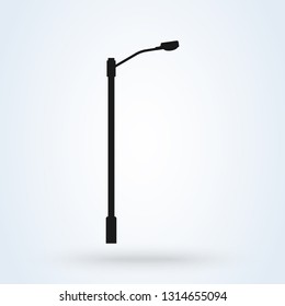 Street light vector icon. Lamppost flat silhouette.