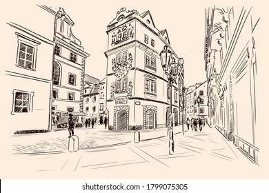 Street of the old Prague city with stone multi-storey buildings. Historical city center.