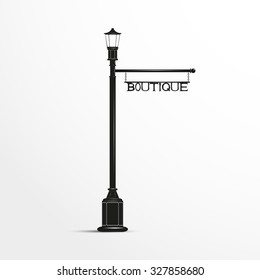 Street post with a sign. Boutique.  Black and white vector illustration.