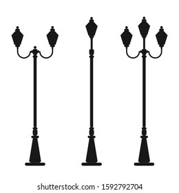 Streetlight vintage lamp silhouette isolated on white background. Vector illustration  of traditional street lamps.