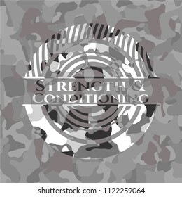 Strength and Conditioning written on a grey camouflage texture