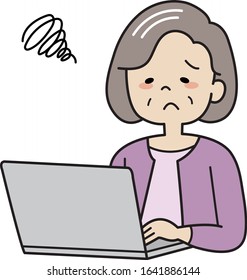 Stressed elderly lady using personal computer