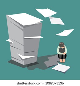 Stressed man sitting with pile of paper work