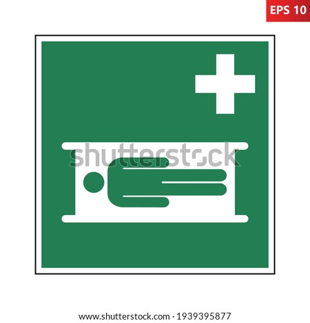 Stretcher sign. Vector illustration of green square sign with human figure on a stretcher icon inside. Foto d'archivio © 