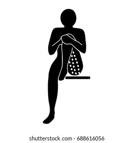 Stretching Exercise Icon to stretch biceps femoris specific seated. Vector silhouette. White background.