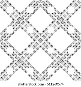 A strict geometric ornament is created from small squares in contrasting colors. Black and white seamless pattern