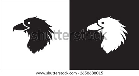 A striking black eagle hawk head on white, mirrored by a white head on black, symbolizing power and vigilance.