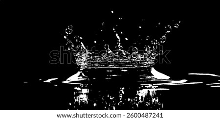 A striking crown-shaped splash erupts from the surface, sending droplets in all directions.