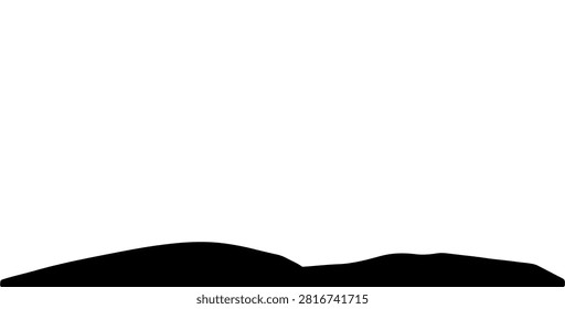 A striking silhouette of a mountain range against a bright, clear sky during sunset, emphasizing natural landscape and outdoor scenery.