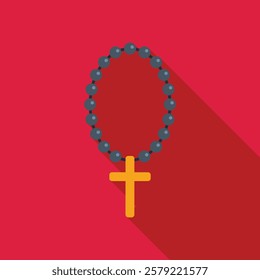 String of rosary beads with a gold cross is lying on a red background