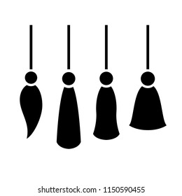 String and tassel design elements on white background