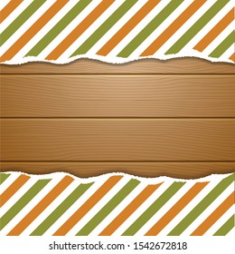 Strip pattern ripped paper with wooden background.
