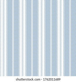 Stripe pattern in blue and white. Herringbone seamless vertical lines for dress, shirt, or other modern summer fashion textile print.