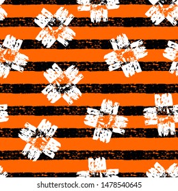 Striped abstract pattern with crosses. Striped black and orange Halloween pattern. Brush stroke grunge stripes vector pattern.