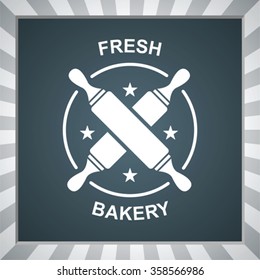 striped background with emblem of the bakery