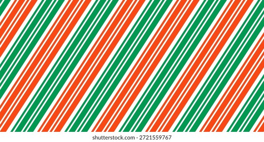 Striped Christmas seamless pattern. Red and green diagonal lines wallpaper. Xmas candy cane peppermint repeating background. Winter holiday present wrapping paper design. Vector decoration backdrop