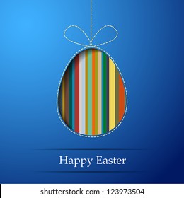 A striped egg on a blue background