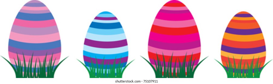 striped eggs in the green grass